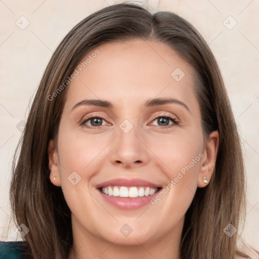 Joyful white young-adult female with long  brown hair and grey eyes