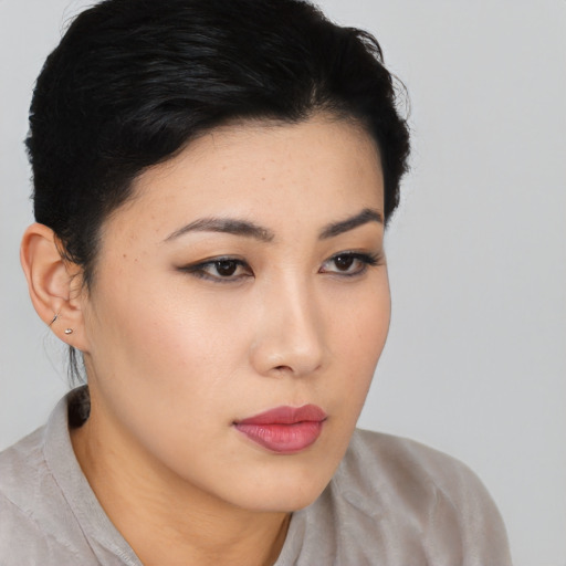 Neutral latino young-adult female with short  black hair and brown eyes