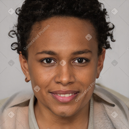 Joyful black young-adult female with short  brown hair and brown eyes