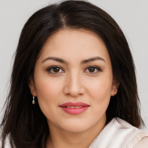 Joyful white young-adult female with long  brown hair and brown eyes