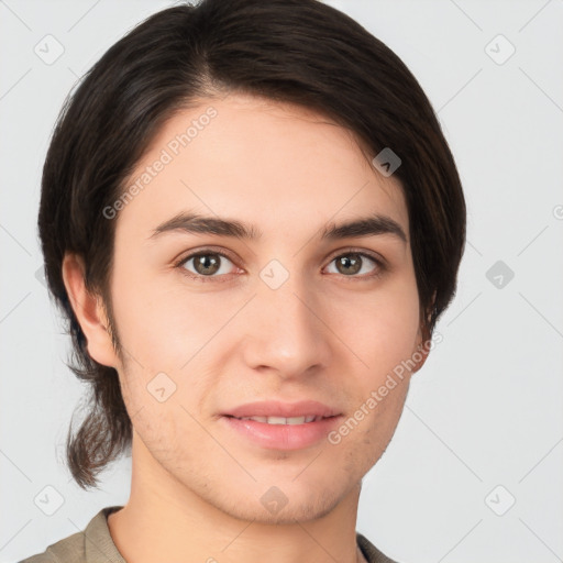 Joyful white young-adult male with medium  brown hair and brown eyes