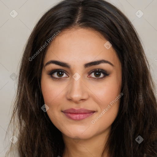 Joyful latino young-adult female with long  brown hair and brown eyes