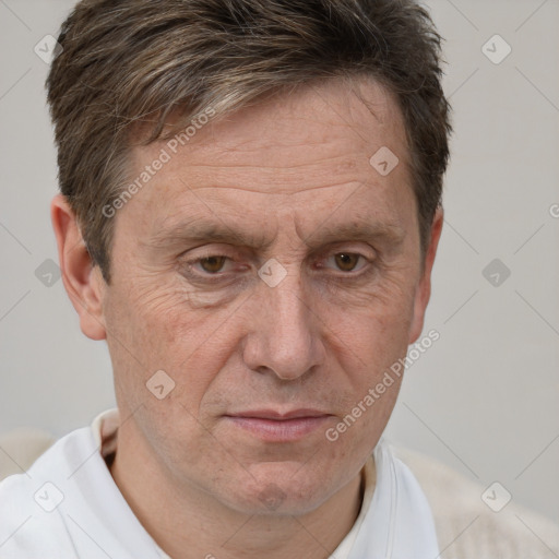 Joyful white middle-aged male with short  brown hair and brown eyes