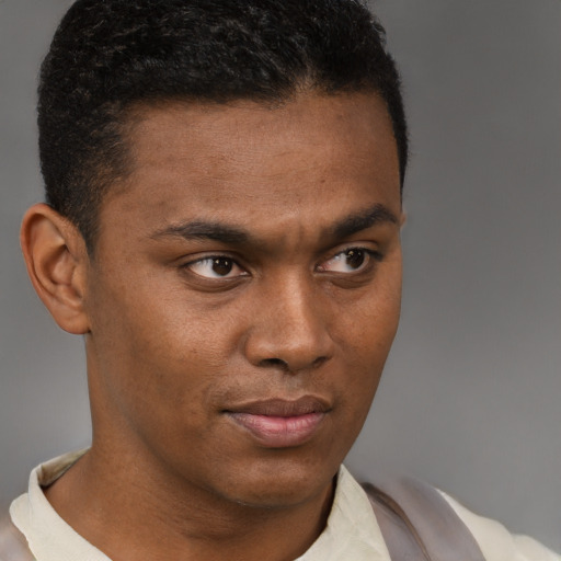 Neutral latino young-adult male with short  brown hair and brown eyes