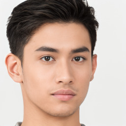 Neutral asian young-adult male with short  brown hair and brown eyes