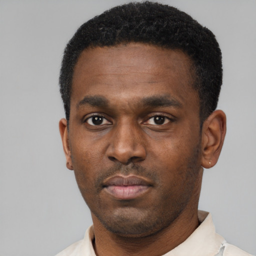 Neutral black young-adult male with short  black hair and brown eyes