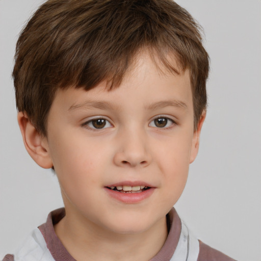 Joyful white child male with short  brown hair and brown eyes