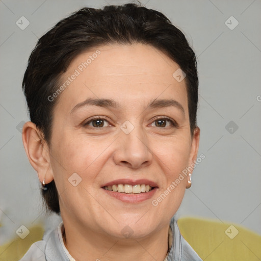 Joyful white adult female with short  brown hair and brown eyes