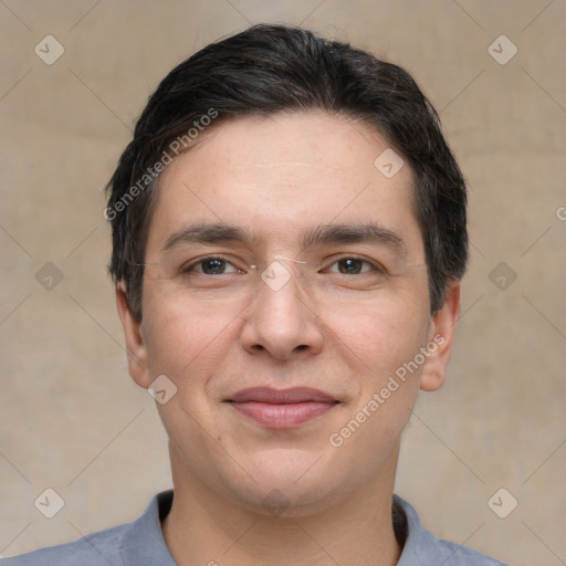 Joyful white adult male with short  brown hair and brown eyes