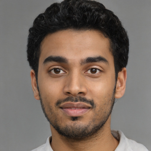 Neutral latino young-adult male with short  black hair and brown eyes