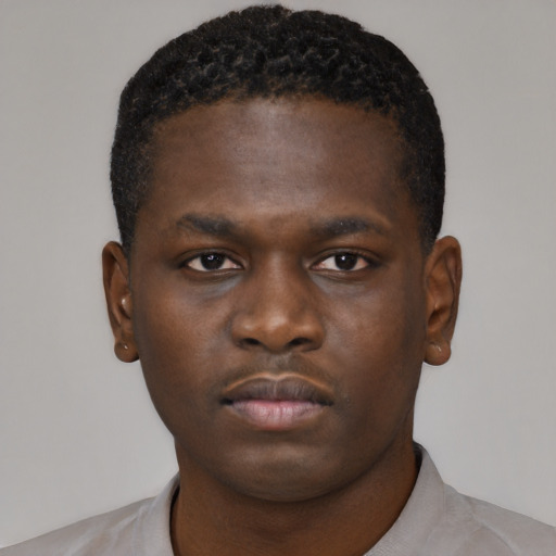 Neutral black young-adult male with short  brown hair and brown eyes