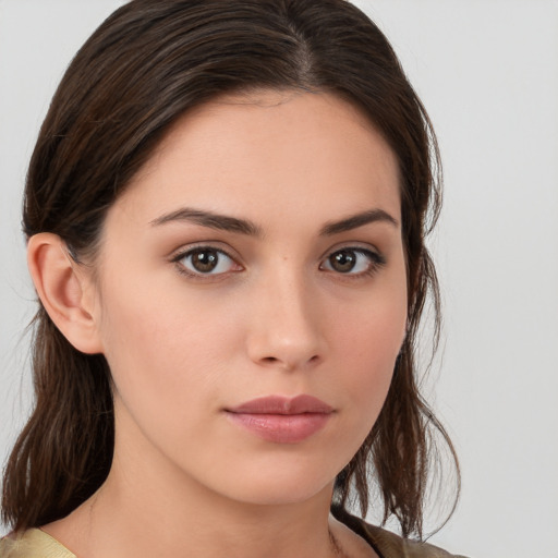 Neutral white young-adult female with medium  brown hair and brown eyes