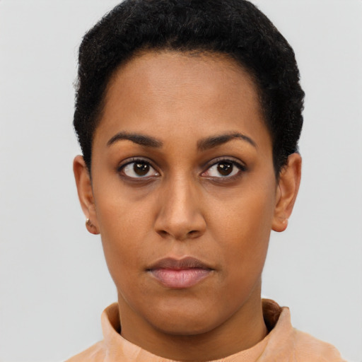 Neutral latino young-adult female with short  black hair and brown eyes