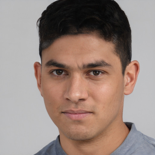 Neutral white young-adult male with short  black hair and brown eyes