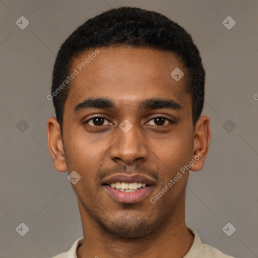 Joyful black young-adult male with short  black hair and brown eyes