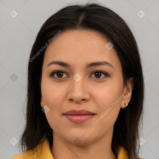 Joyful latino young-adult female with medium  brown hair and brown eyes