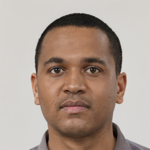 Neutral black young-adult male with short  black hair and brown eyes