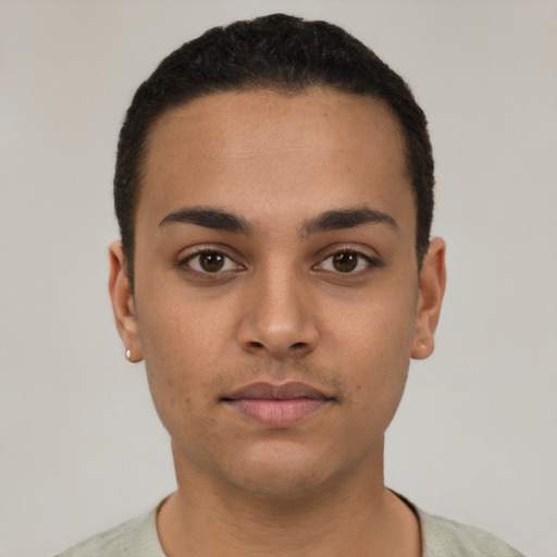 Neutral latino young-adult male with short  black hair and brown eyes