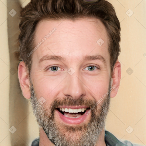 Joyful white adult male with short  brown hair and grey eyes