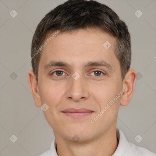 Joyful white young-adult male with short  brown hair and brown eyes