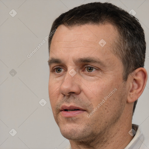 Neutral white adult male with short  brown hair and brown eyes