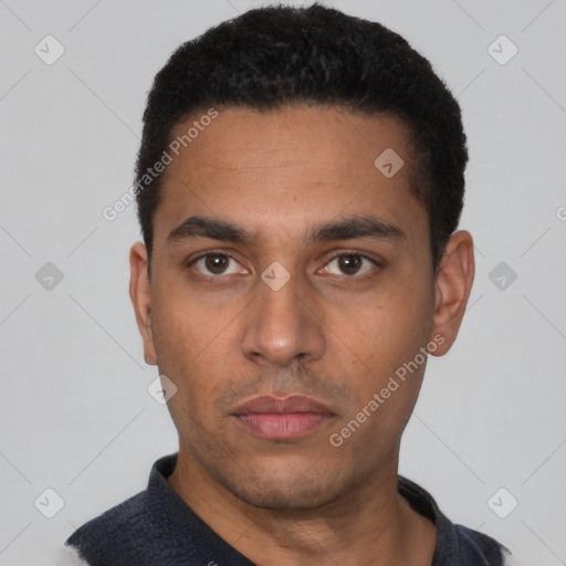 Neutral latino young-adult male with short  black hair and brown eyes