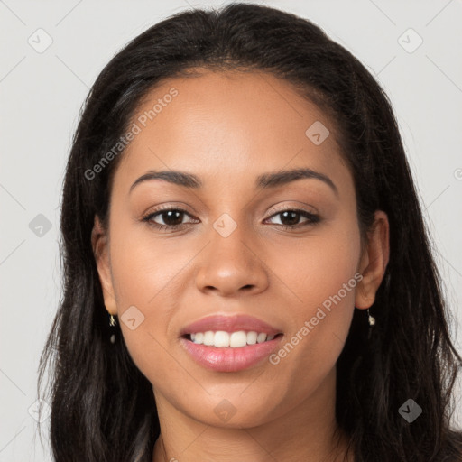 Joyful latino young-adult female with long  brown hair and brown eyes