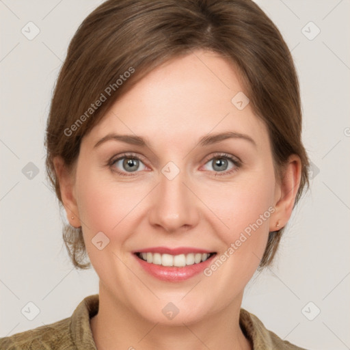 Joyful white young-adult female with medium  brown hair and green eyes