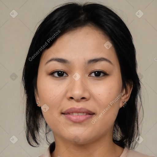 Joyful asian young-adult female with medium  black hair and brown eyes