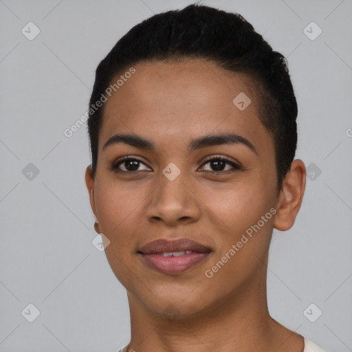 Joyful latino young-adult female with short  black hair and brown eyes