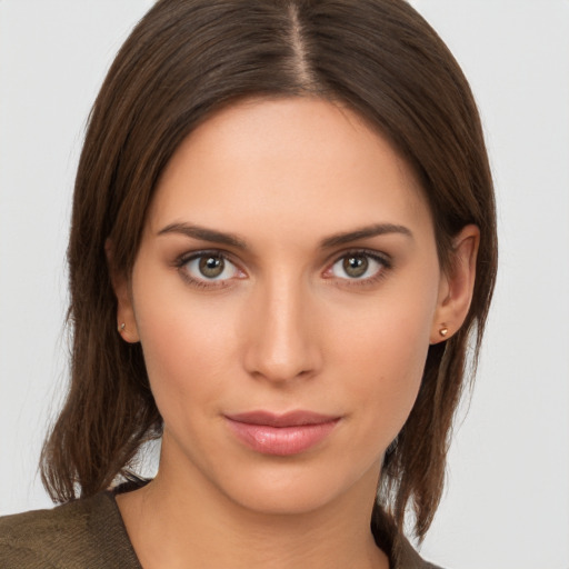 Neutral white young-adult female with medium  brown hair and brown eyes