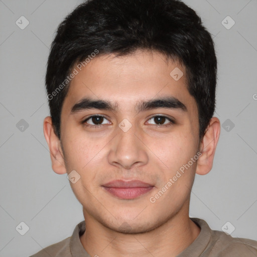 Joyful white young-adult male with short  black hair and brown eyes