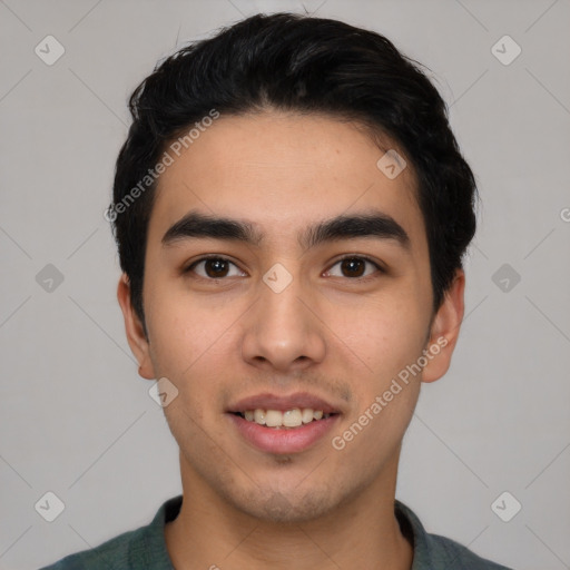 Joyful white young-adult male with short  black hair and brown eyes