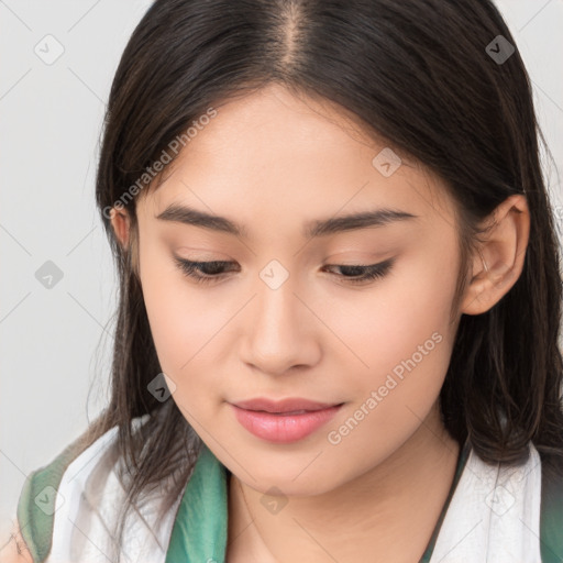 Joyful asian young-adult female with long  brown hair and brown eyes