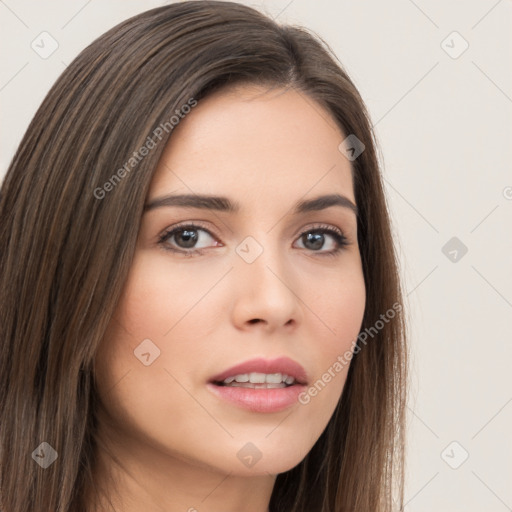 Neutral white young-adult female with long  brown hair and brown eyes