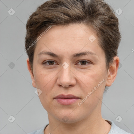 Joyful white adult female with short  brown hair and brown eyes