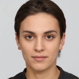 Neutral white young-adult female with short  brown hair and brown eyes