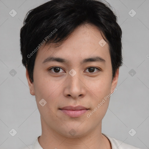 Joyful asian young-adult male with short  brown hair and brown eyes