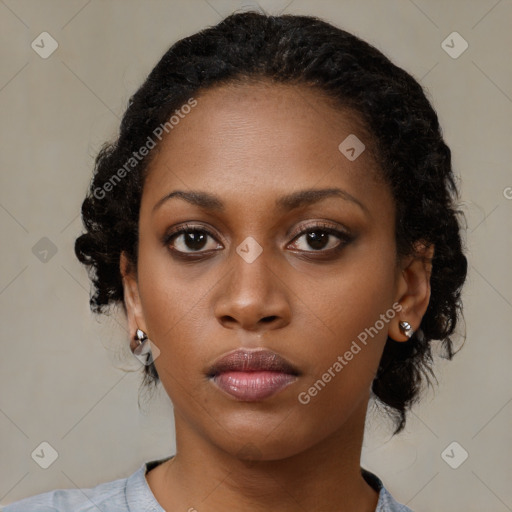 Neutral black young-adult female with medium  black hair and brown eyes