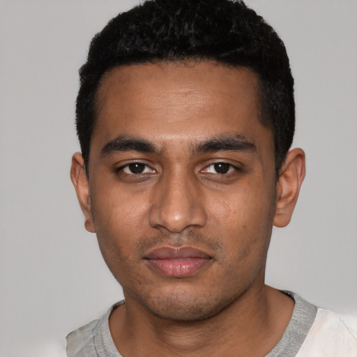 Neutral black young-adult male with short  black hair and brown eyes