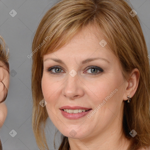 Joyful white adult female with medium  brown hair and brown eyes