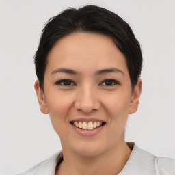 Joyful asian young-adult female with short  brown hair and brown eyes