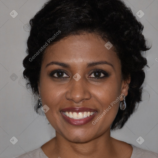 Joyful black young-adult female with medium  brown hair and brown eyes