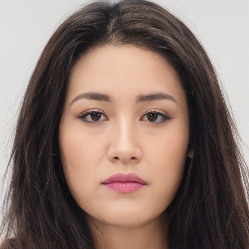 Neutral asian young-adult female with long  brown hair and brown eyes