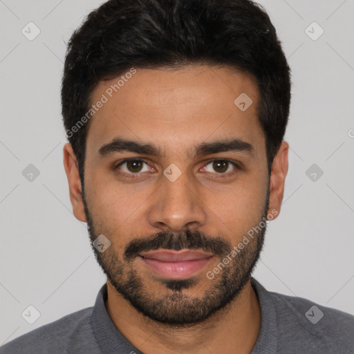 Joyful latino young-adult male with short  black hair and brown eyes