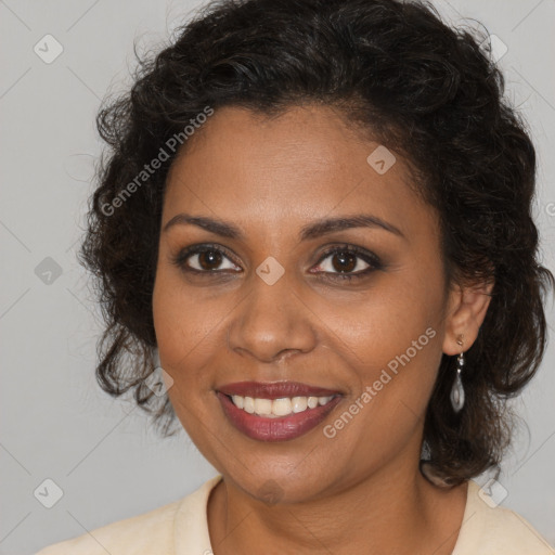 Joyful black young-adult female with medium  brown hair and brown eyes