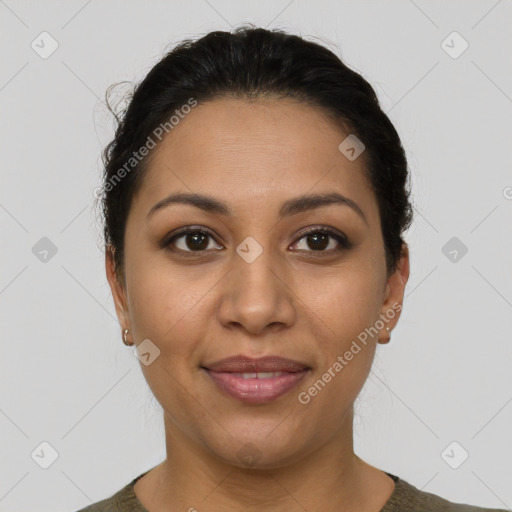 Joyful latino young-adult female with short  brown hair and brown eyes