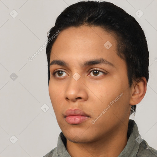 Neutral latino young-adult male with short  black hair and brown eyes