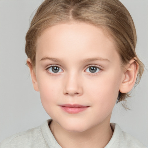 Joyful white child female with medium  brown hair and grey eyes