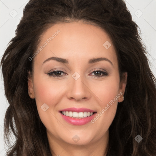 Joyful white young-adult female with long  brown hair and brown eyes